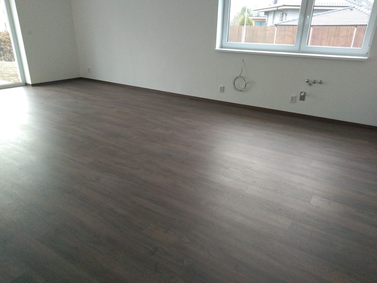 Obložené schodiště navazující na podlahu